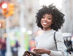Woman enjoying a day on the town and smiling