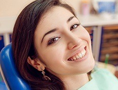 Smiling woman in dental chair