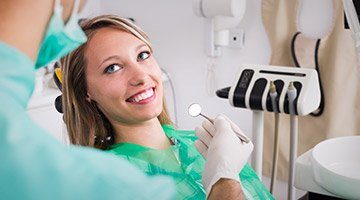 Smiling woman in dental chair