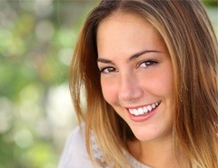 woman smiling outside