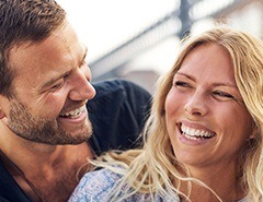 Man and woman laughing together