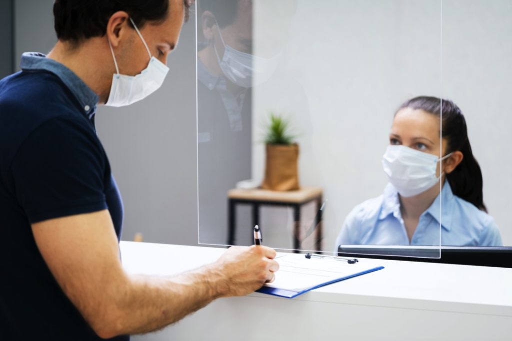 Plastic barrier at dentist in Newark