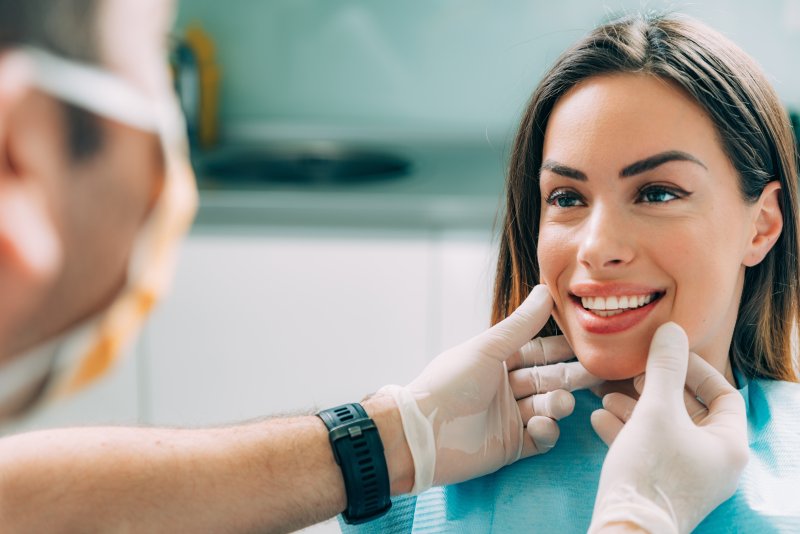 Woman after cosmetic dental treatment